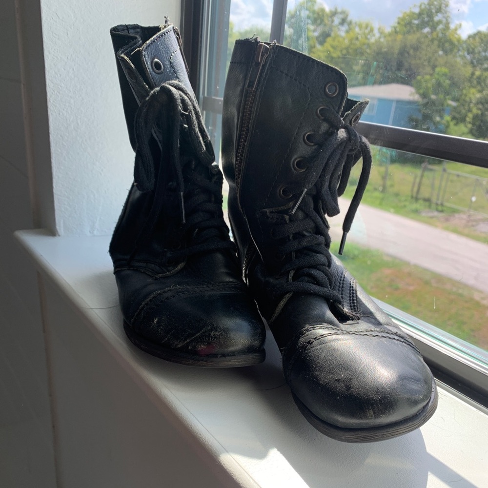 Steve Madden black distressed combat boots